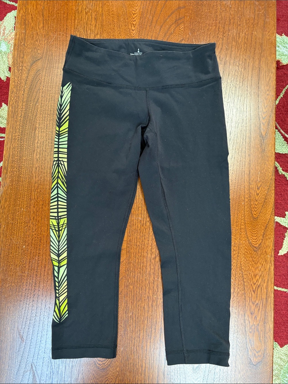 lululemon athletica Black Capri Leggings with Yellow-Green Side Stripe 6